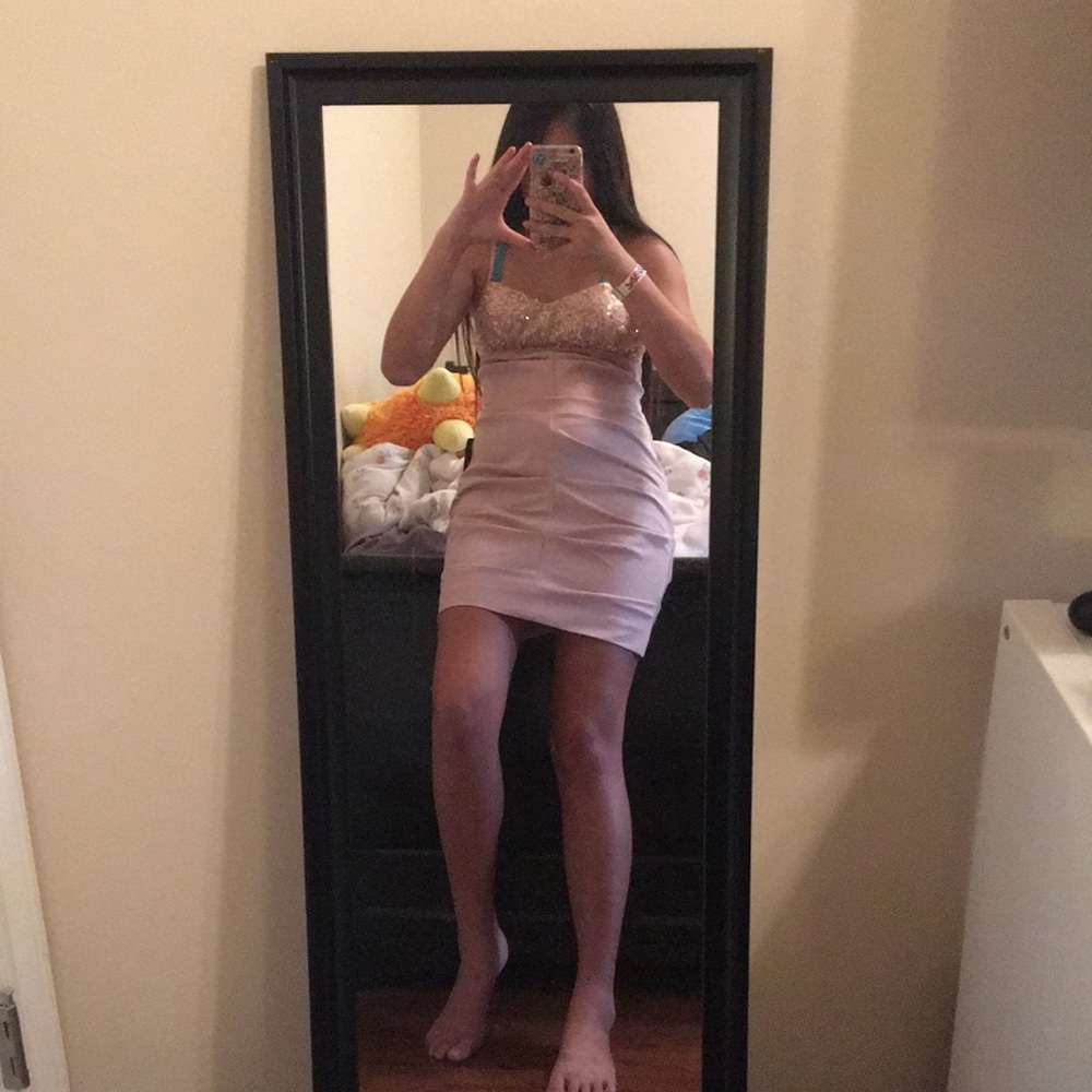 A light pink dress with glitter at the top